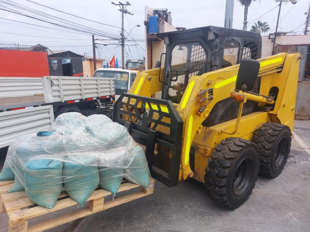Carga de Pallet con Minicargador